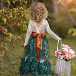 Back view of white lace flower girl dress with hunter green floral embroidered  tulle skirt