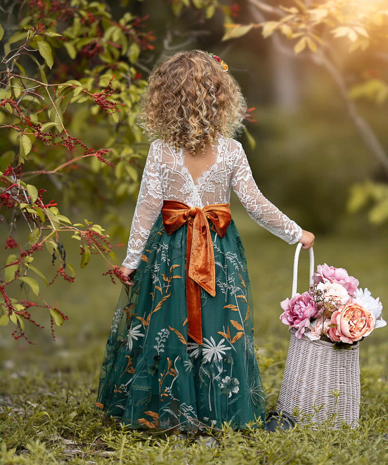 Back view of white lace flower girl dress with hunter green floral embroidered  tulle skirt