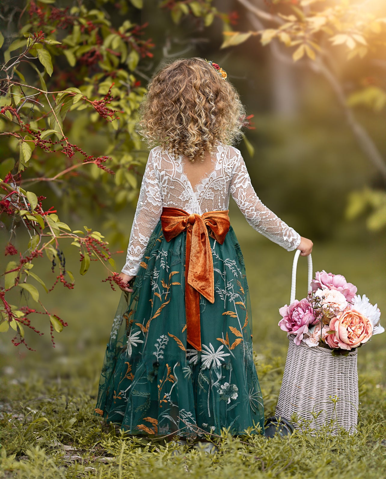 Back view of white lace flower girl dress with hunter green floral embroidered  tulle skirt